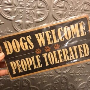 Brown and Black Dog Welcome Sign